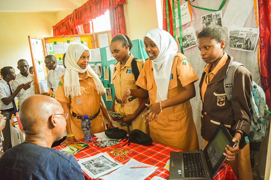 PeakStars from Murray Girls present their training company to Governor of Taita Taveta.